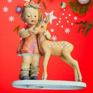 Figurine of girl and deer